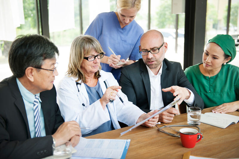 group of medical people having a meeting